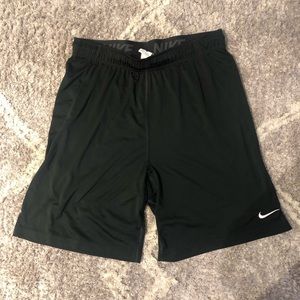 Size Large Mens black dri-fit shorts with white swoosh. In like new condition